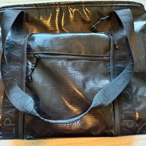 Calpak Terra 35L water resistant zippered tote bag